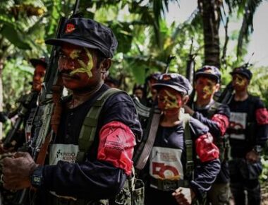 epa07250097 Fighters of the New People's Army-Melito Glor Command (NPA-MGC) gather at an undisclosed location in the mountains of Sierra Madre in Quezon Province, south of Manila, Philippines, 26 December 2018, to celebrate the 50th year founding of the Communist Party of the Philippines (issued 27 December 2018). New People's Army rebels celebrate the founding anniversary of the Communist Party of the Philippines (CPP) in small groups to avoid military operations according to a media release by the CPP information bureau. The CPP was established along Maoist lines on 26 December 1968, by then university professor Jose Maria Sison and a handful of followers who broke away from the old Soviet-oriented party.  EPA/ALECS ONGCAL  ATTENTION: This Image is part of a PHOTO SET